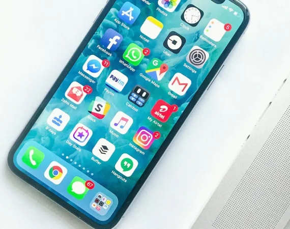 Smartphone and Canadian Telecom Cellular Contract Sim Card on Desk