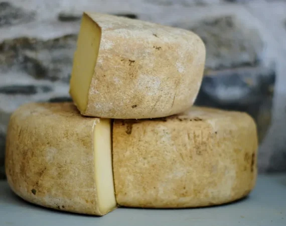 Block of Artisan Cheddar and Gourmet Butter in Canadian Supermarket Grocery Deli